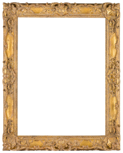 French Louis XV carved, pierced and gilded limewood frame