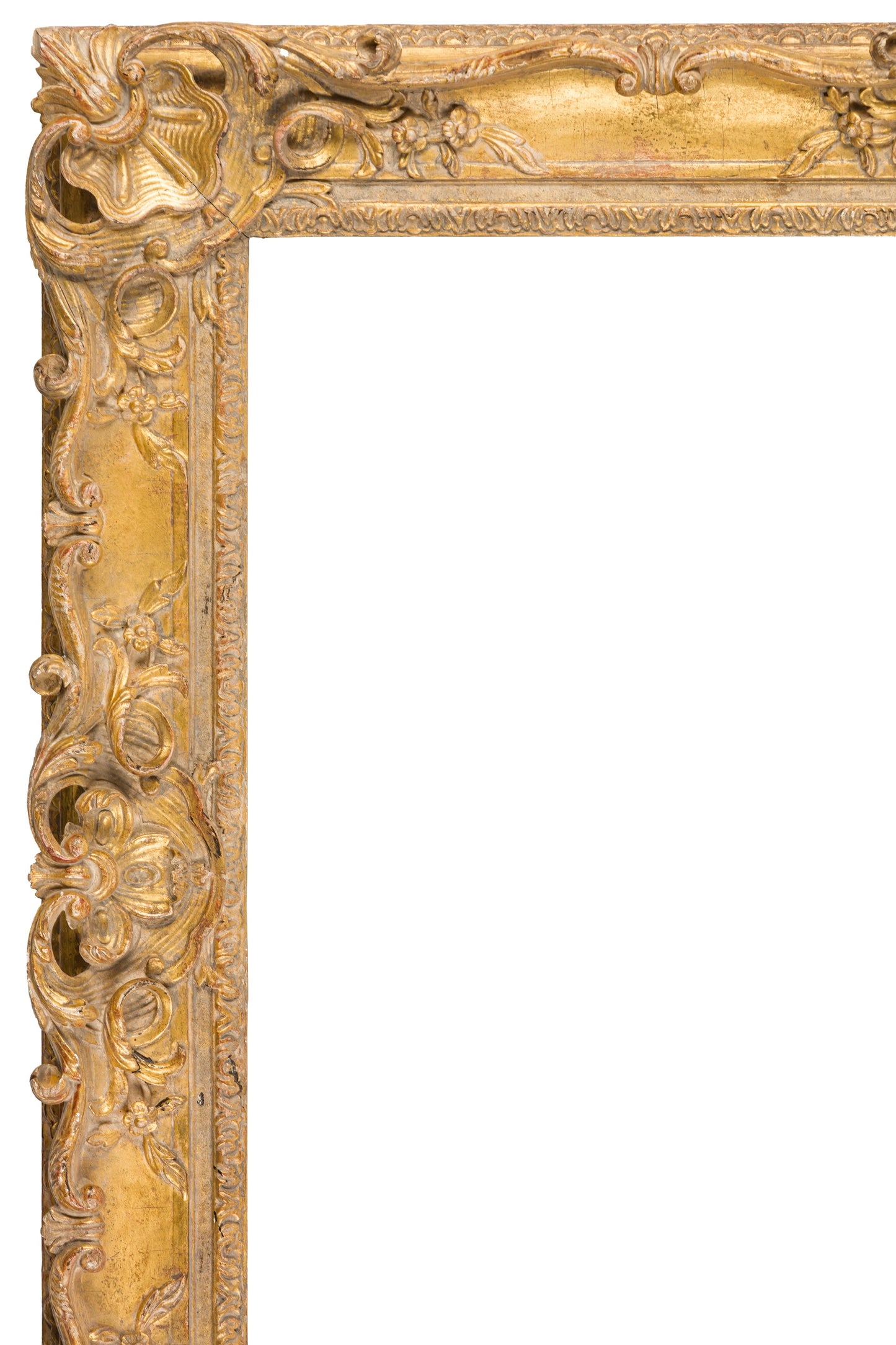 French Louis XV carved, pierced and gilded limewood frame