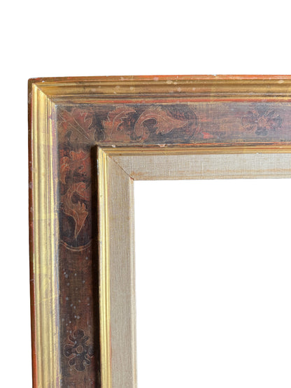 A painted Casetta frame with gilt inner and outer edges and a linen slip