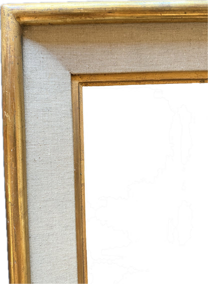 Gilt frame with a linen inner section