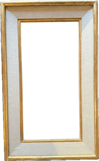 Gilt frame with a linen inner section