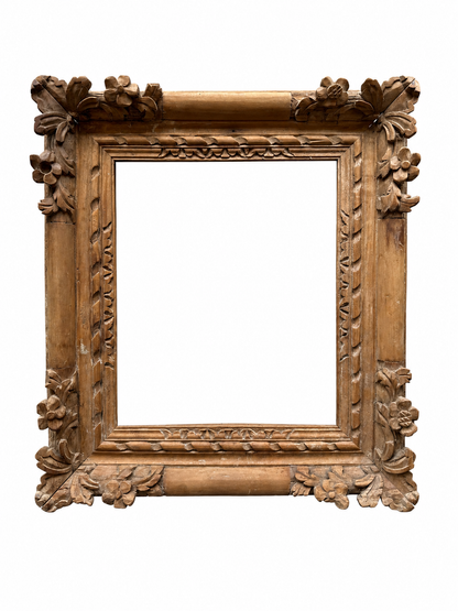 A late 18th century stripped Louis XV carved frame