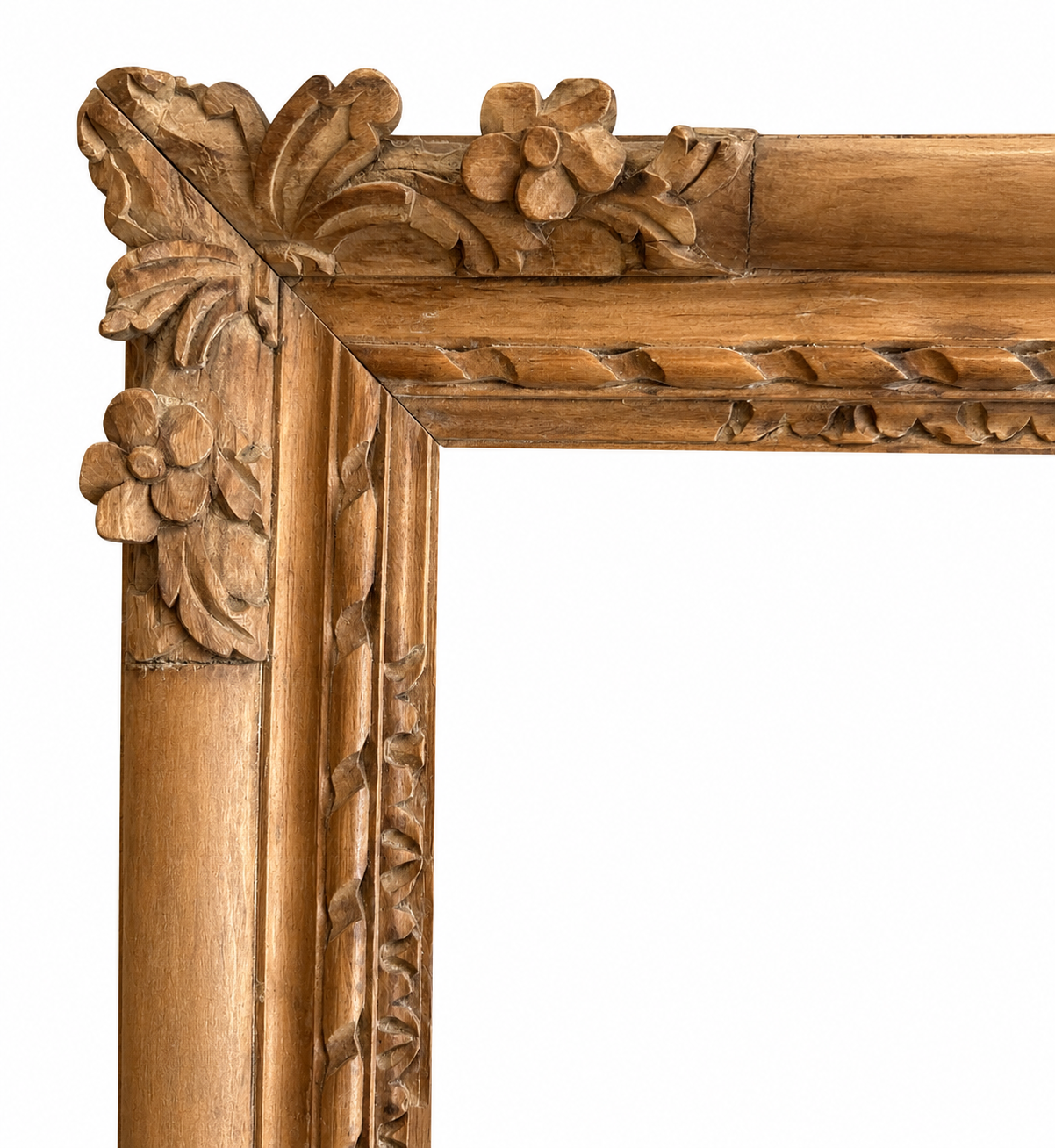 A late 18th century stripped Louis XV carved frame