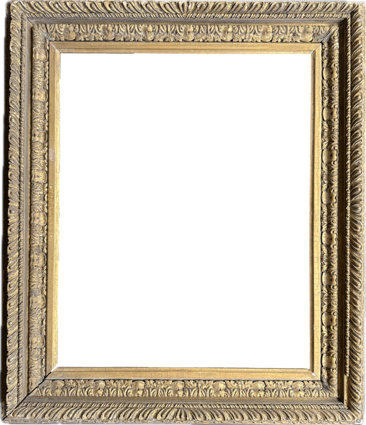 An intricately carved English 17th century Carlo Maratta frame